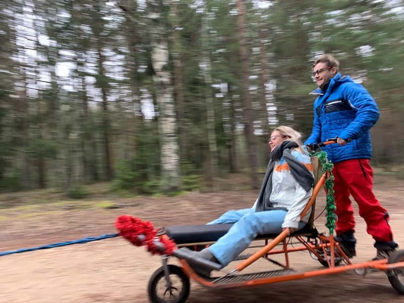 From Riga: Husky Sledding or Wheel Kart Tour - A 30-minute forest walk and 320-step tower climb