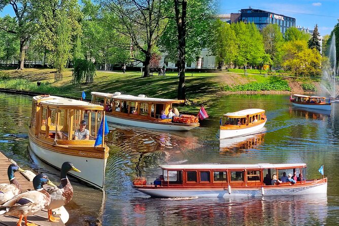 Riga City Canal & Daugava River Premium Boat Tour with Audioguide - Spikeri, the Old Town skyline, and the National Library