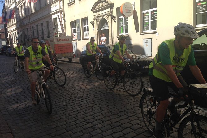 Riga Highlights Bike Tour - The Academy of Sciences points to the Soviet period