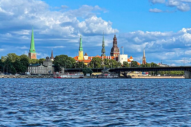 Riga Sightseeing Tour by Canal Boat with Audioguide - Under the Stockmann tunnel and toward the new railway