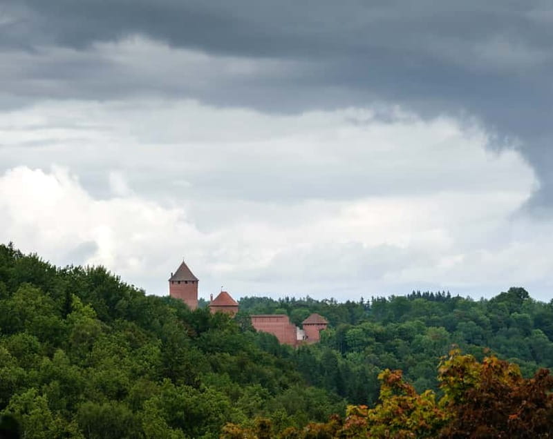 Sigulda Day Tour - Castle Ruins, Gūtmaņala Grotto, & More - Walking through Sigulda Castle ruins